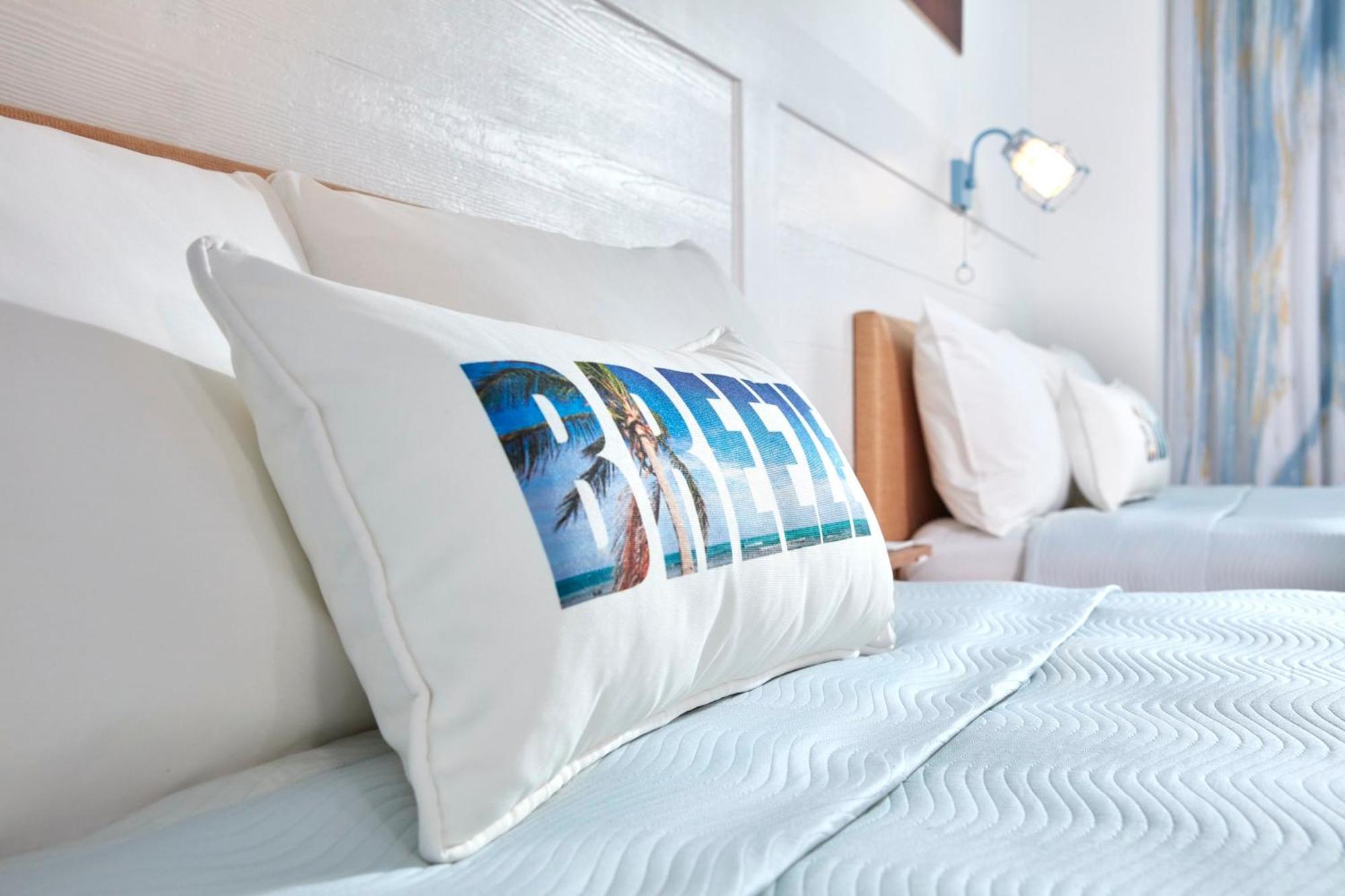 Two-Bedroom Suite Pool View Roll Shower Mobility Accessible Includes Early Park Admission*,1328809958:JPEG