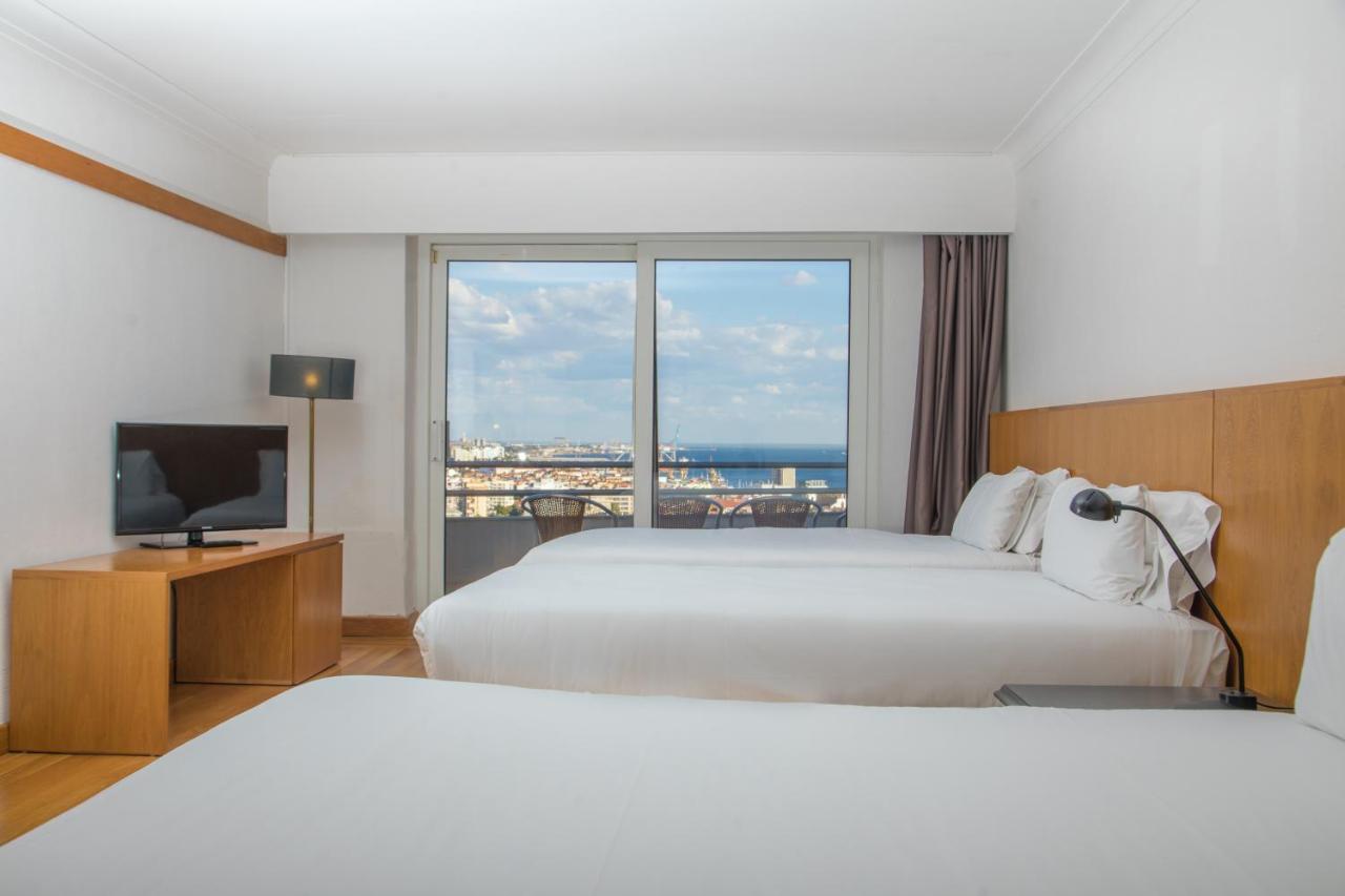 Quarto Quádruplo com Vista Mar
