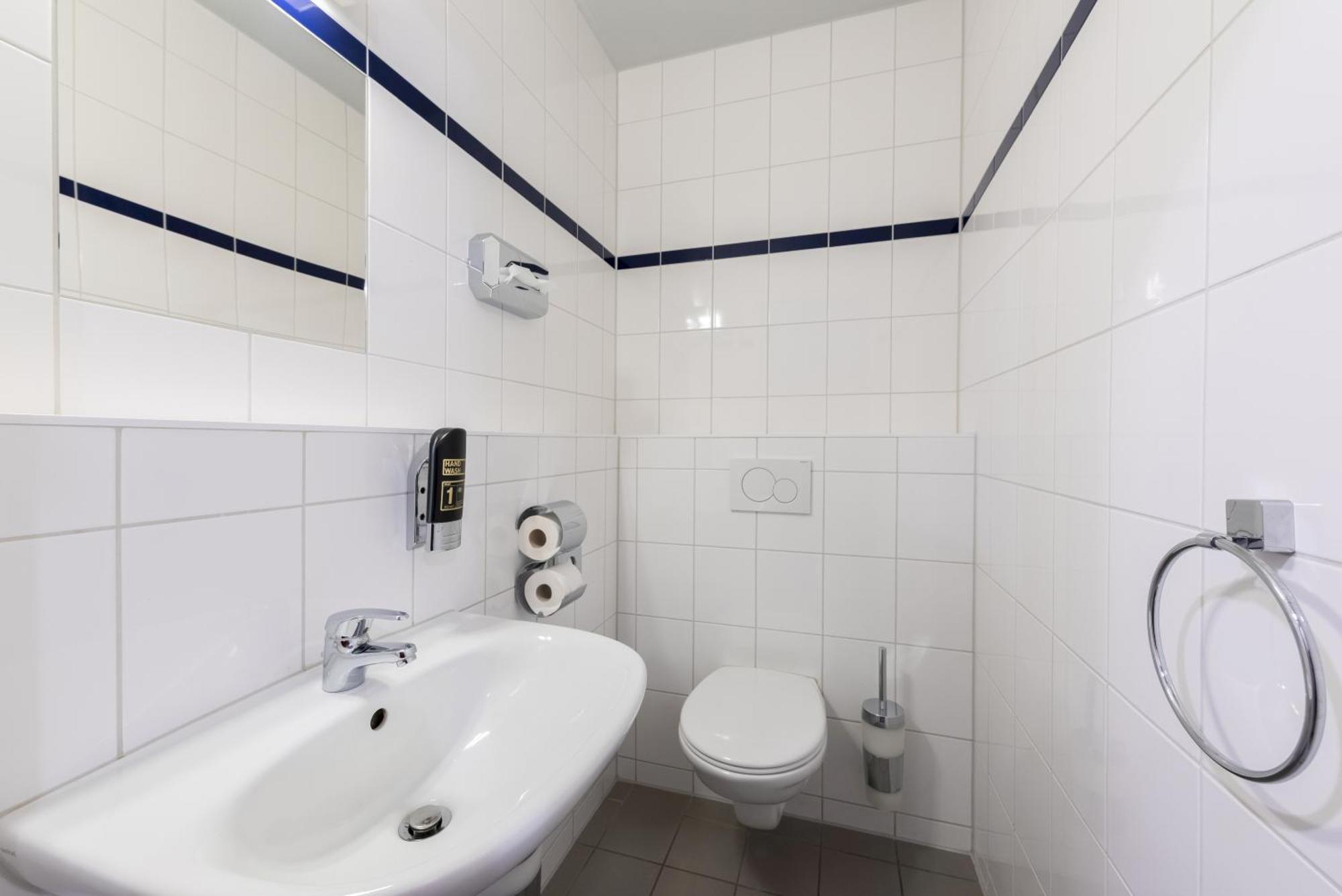 Kamer met twee aparte bedden voor eenpersoonsgebruik