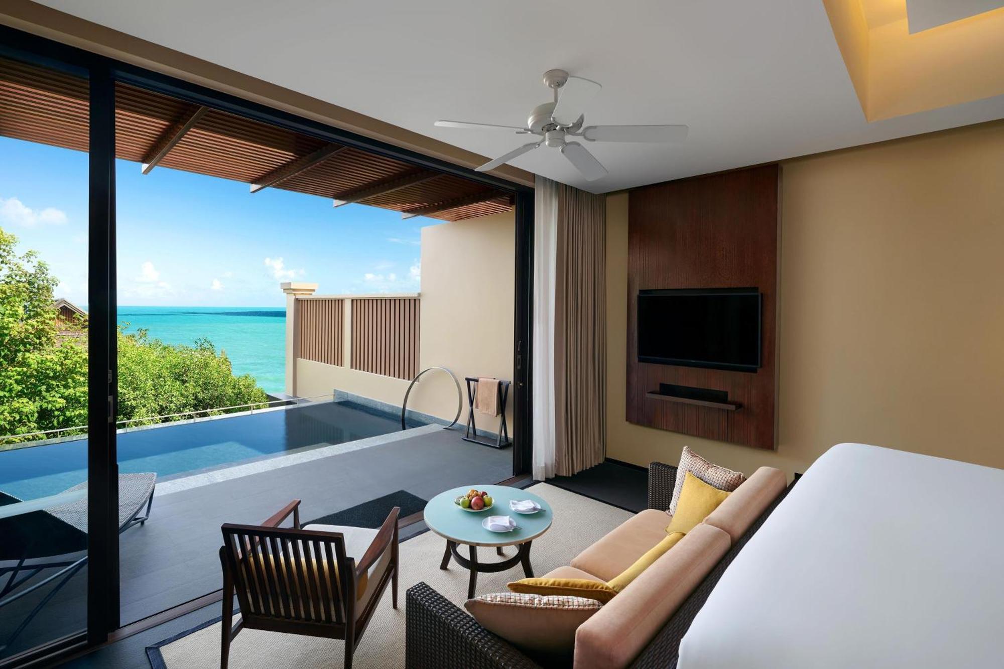 Suite mit 1 Schlafzimmer mit Kingsize-Bett, Schlafsofa, Pool und Meerblick