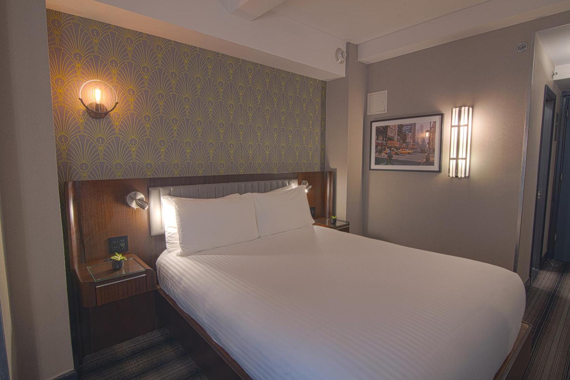 Quarto com 1 Cama Queen-size Signature