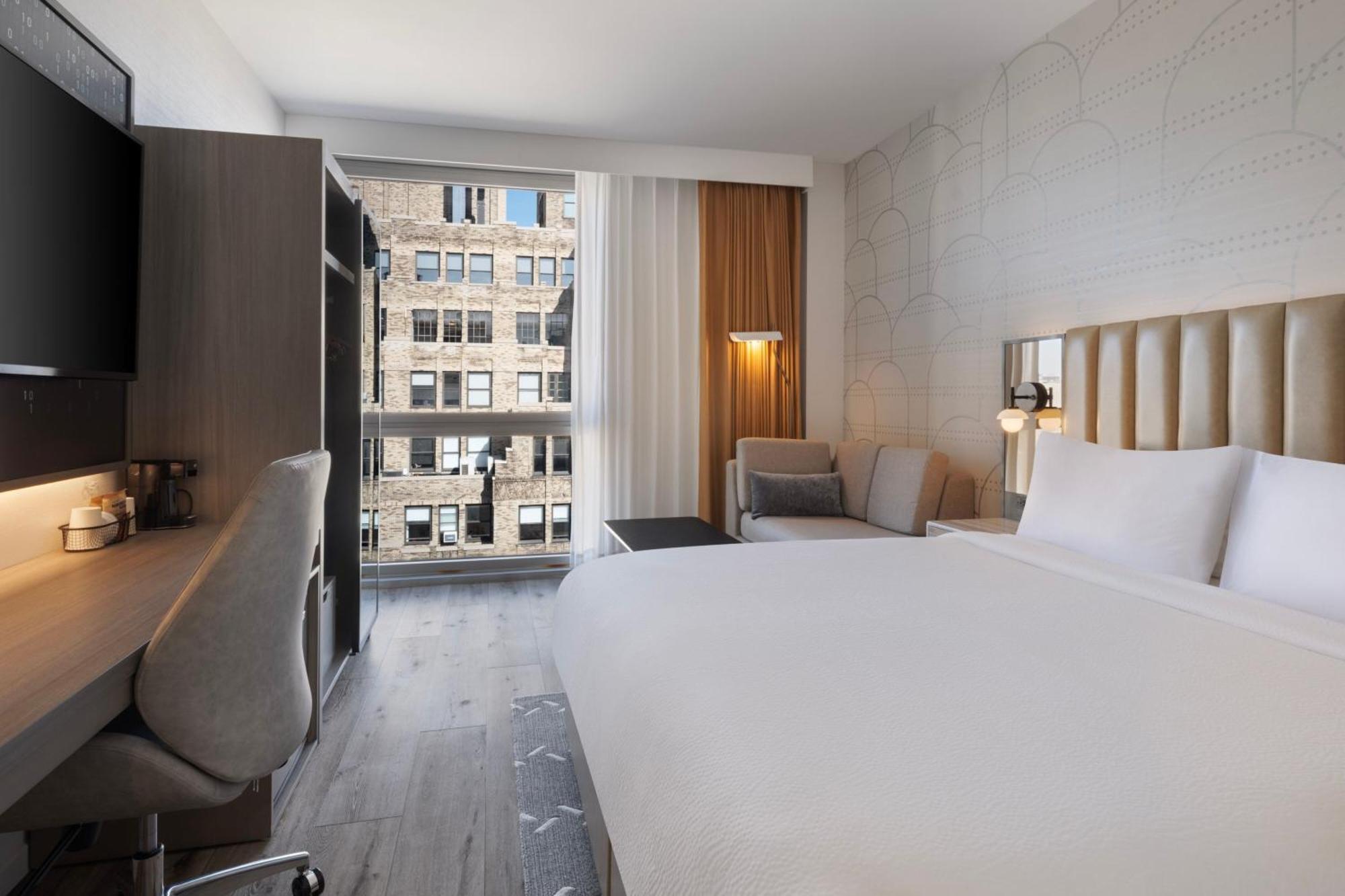 Quarto com Cama King-size e Sofá-cama