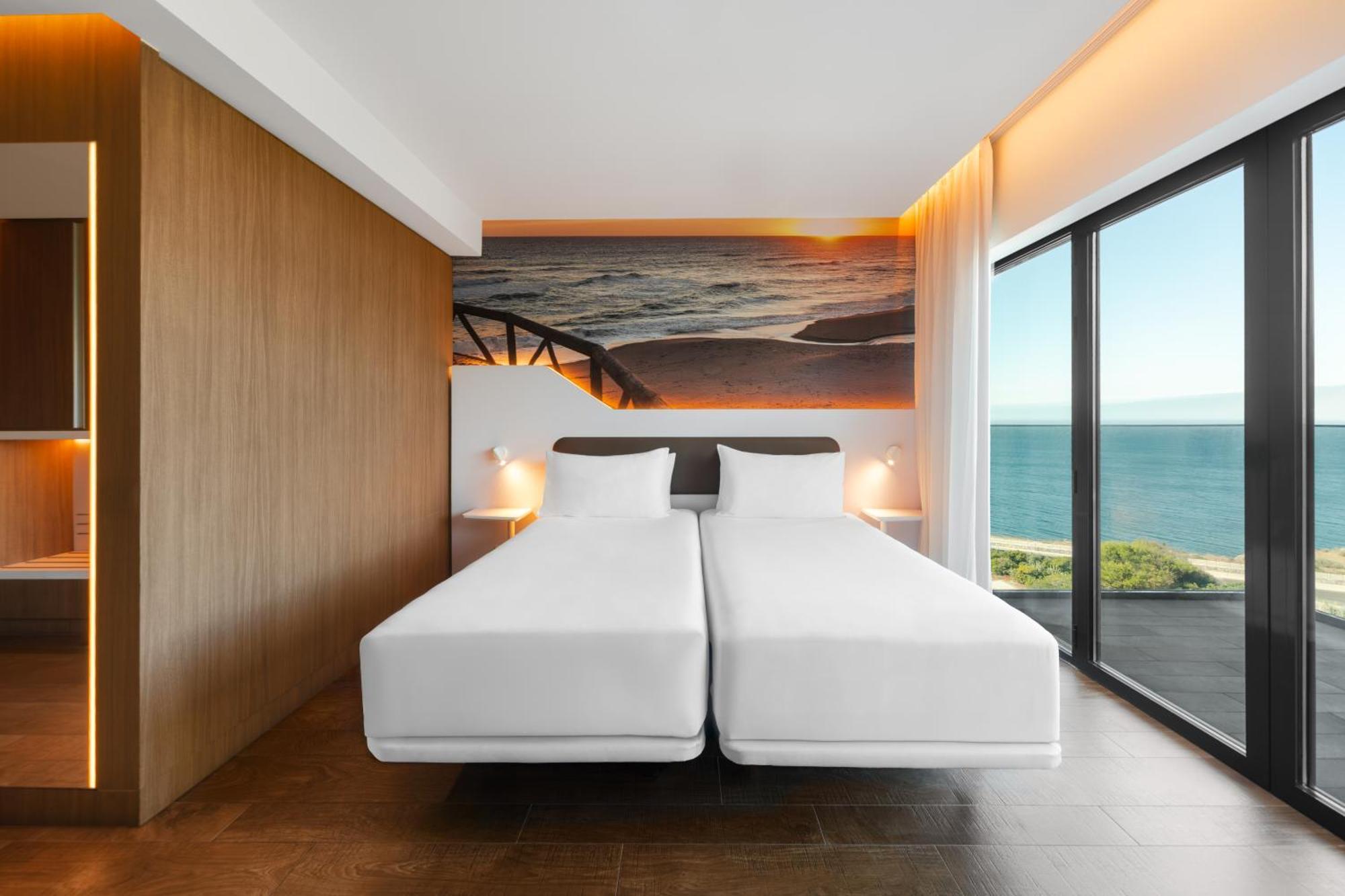 Habitación Doble con balcón y vistas al mar - 1 cama grande o 2 individuales