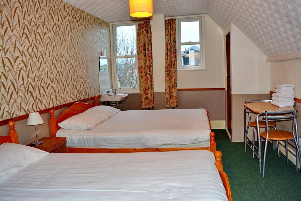 Twin Room Communal Bathroom