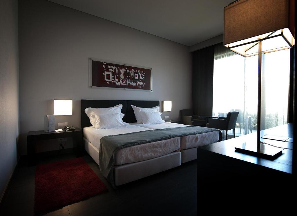 Quarto com 2 Camas de Solteiro e Vista do Mar