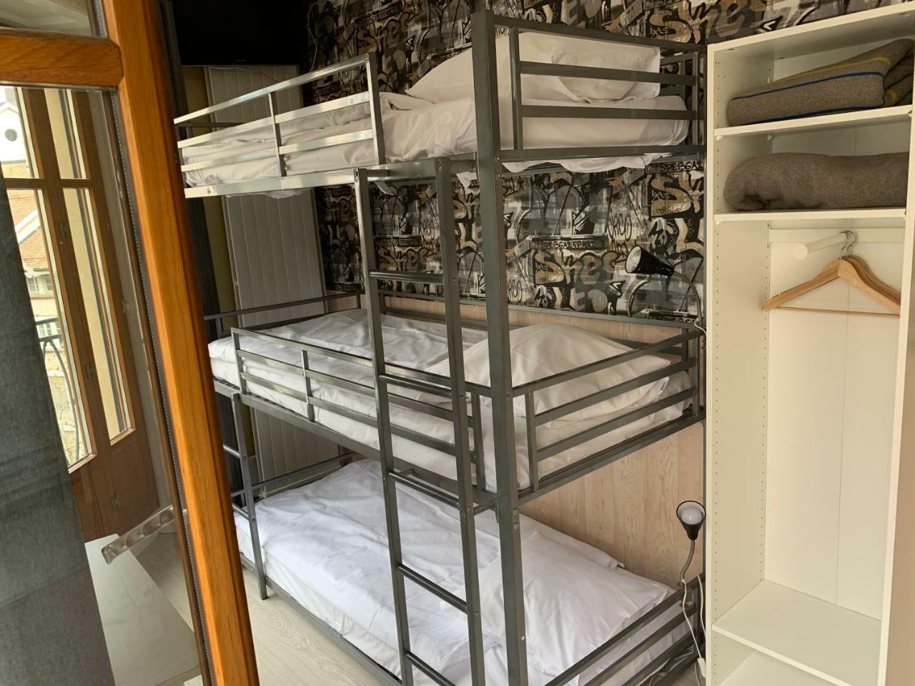 Triple Bunk Bed Room Shared Toilet