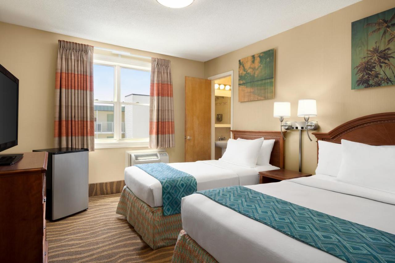 Side View w or One Double Bed & One Single Bed Non Smoking